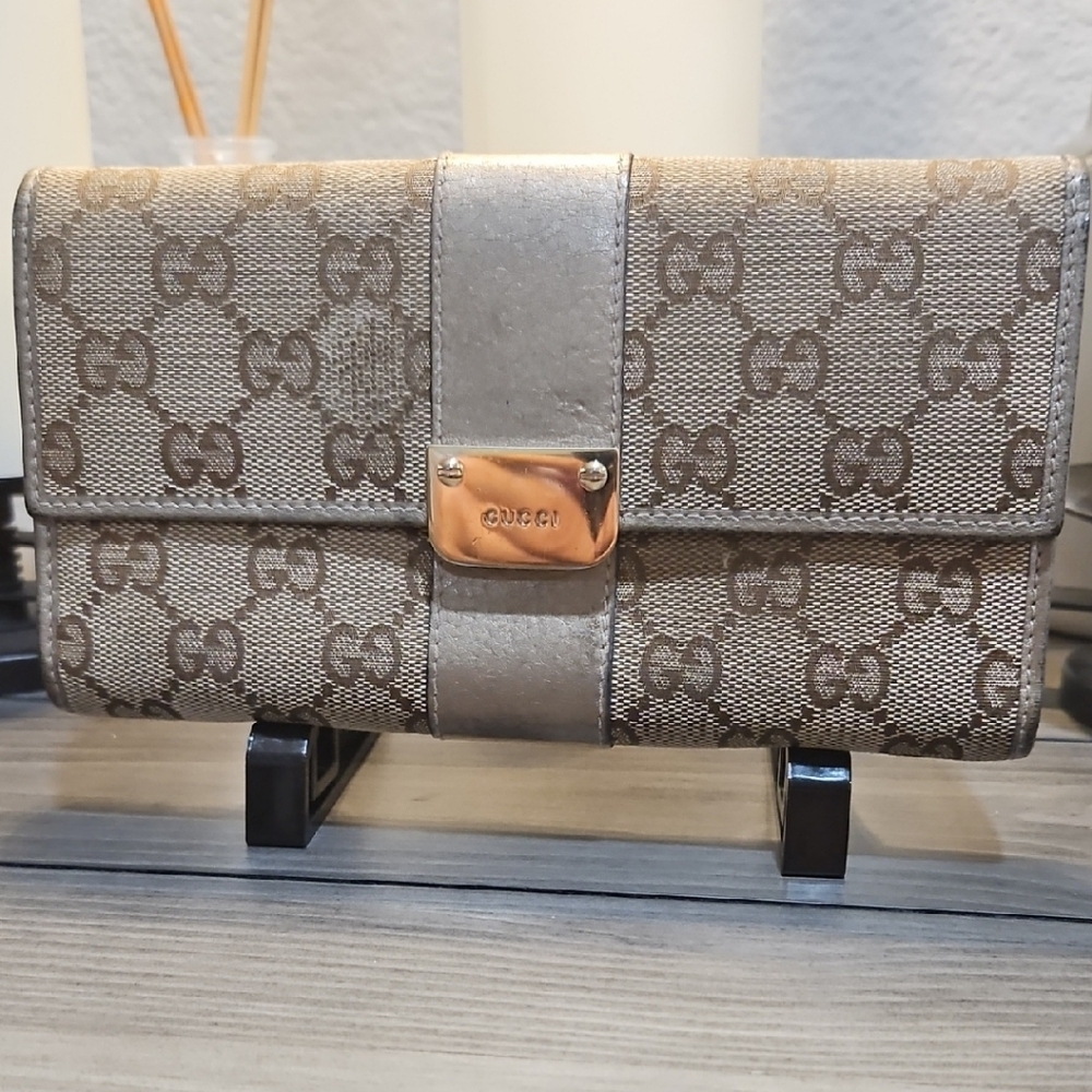 Gucci Brown Wallet with Iconic Monogram Design